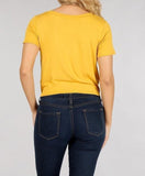 Solid short sleeve cropped tee with a round neckline