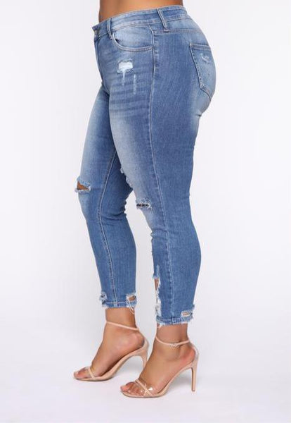 Distressed Mid Rise Skinny Jean - Medium Wash