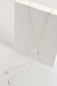 Long necklace with natural fresh water pearl and two chain tassle